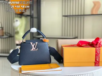 <p> 特级精品原厂皮M21150M58718深蓝色贝壳扣 本款 Capucines 迷你手袋为 Taurilon 皮革浸染明快</p><p>色彩 将莹润贝壳嵌入 LV 字母 皮革手柄实现优</p><p>雅手提 可拆卸宽幅肩带增먹頃肩背和斜挎选择 </p><p>详细特征</p><p>21x14x8厘米</p><p> 长度 x 高 x 宽 </p>