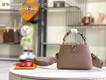 <p> 163 芯片  特级精品原厂皮 M80041深咖配蟒蛇金扣  本款 Capucines 迷你手袋取材深染 Taurillon 皮革 以华丽蟒蛇皮点缀手柄和翻盖 无论手提或系上宽肩带肩背 均可在任意场合释放瞩目格调 </p><p>详细特征 21 x 14 x 8 厘米</p><p>长度 x 高 x 宽</p>
