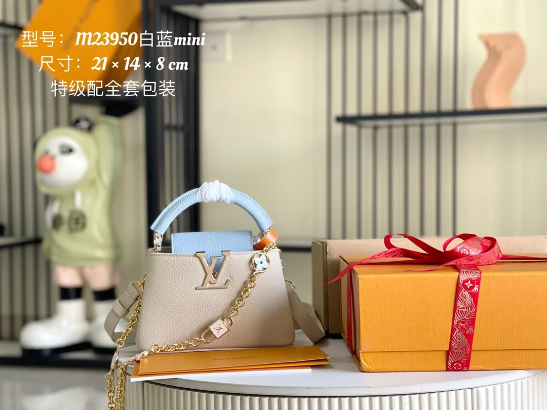 原单LV女包|高仿LV女包|精仿LV女包|一比一LV女包<p>特级配全套包装P变码芯片 特级精品原厂皮 M23950 蓝色配白色金升级版五金 本款 Capucines 迷你手袋取材 Taurillon 皮革 以珐琅 Monogram 花簇和耀目链环构筑花卉链条 每只花卉均通过手工抛光和上釉显色 彰显品牌精湛匠艺 尺寸  21x 14x 8 厘米</p>