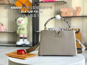 <p> 163 芯片 特级配全套包装 特级精品原厂皮 M80041大象灰配蟒蛇金扣  第一家路易威登门店开在巴黎的嘉布遣街上 Capucines手袋与品牌一样经久不衰 可以为任何造型带来时尚的精致感 全粒面Taurillon皮与稀有宽纹蟒蛇皮结合 打造出一款奢华的手提包 各种传统的细节是手袋的亮点 LV首字母 独特的边环 翻盖上精细的Monogram花朵 配有顶部手柄 可脱卸包带与独特包盖 多种背携风格 适应不同造型或心情 </p><p> 进口荔枝纹牛皮</p><p> 原厂全钢拉丝五金</p><p>尺寸 31.5 x 20.0 x 11.0 cm</p>